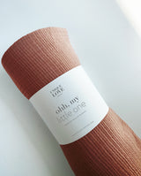 Musselindecke in terrakotta gerollt mit Banderole: "ohh, my little one"